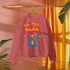 A Christmas sweatshirt featuring a playful design with a cartoon Baphomet goat character wearing a Santa hat. The design includes the text "All Hail Santa" above the goat, with pentagrams in flames on either side. The goat is depicted in a meditative pose, adding a humorous and irreverent twist to holiday attire.